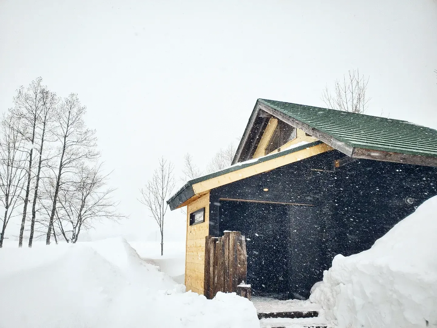 A facility at Makkari bonfire campsite covered in snow