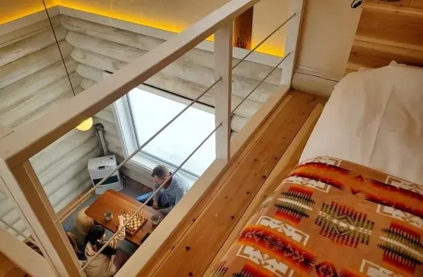 Interior view from the second floor of a log house